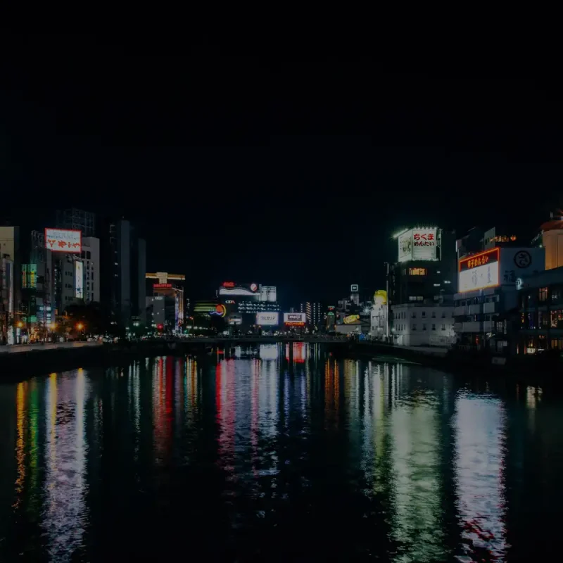 Image of a city with billboards symbolizing billboard dimensions by country in an abstract way.